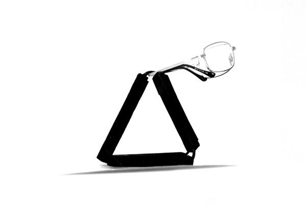 Plio foldable glasses stand product design by Stoa Design for Audiooptica